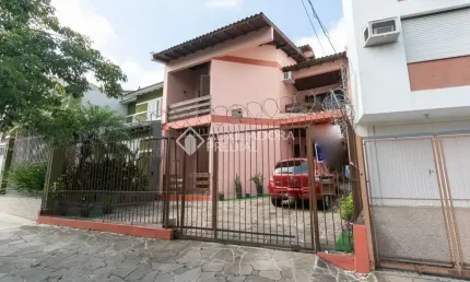Casa com 4 quartos à venda na Rua Edmundo Bastian, 745, Cristo Redentor, Porto Alegre, 294 m2 por R$ 1.000.000