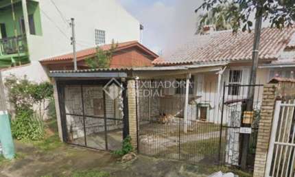 Casa em condomínio fechado com 3 quartos à venda na HENRIQUE MATIAS RIBEIRO, 883, Jardim Algarve, Alvorada, 85 m2 por R$ 200.000