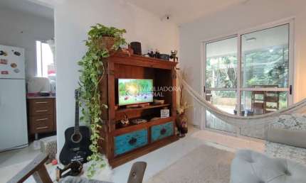 Casa em condomínio fechado com 3 quartos à venda na Estrada Caminho do Meio, 5425, Stella Maris, Alvorada, 65 m2 por R$ 298.000