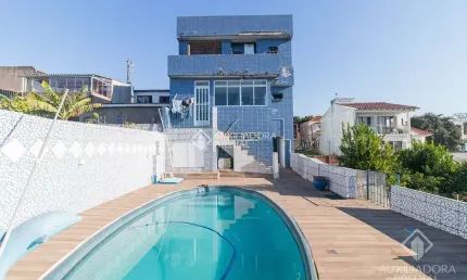 Casa com 3 quartos à venda na rua sílvio romero, 38, partenon, porto alegre, 381 m2 por r$ 980.000