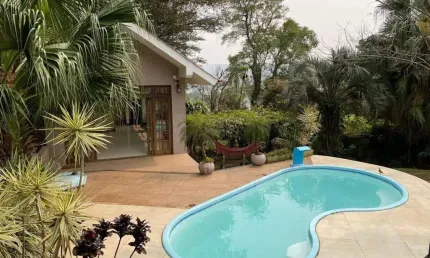 Casa com 5 quartos à venda na Rua dos Guaranis, 390, Espírito Santo, Porto Alegre, 218 m2 por R$ 1.050.000