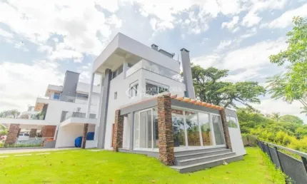 Casa em condomínio fechado com 3 quartos para alugar na Avenida Coronel Marcos, 1239, Pedra Redonda, Porto Alegre, 335 m2 por R$ 29.900