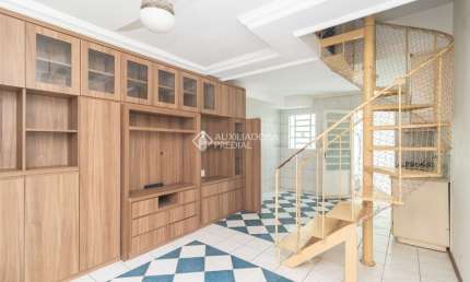 Casa em condomínio fechado com 3 quartos para alugar na Rua Professor Joaquim Louzada, 300, Camaquã, Porto Alegre, 90 m2 por R$ 1.700
