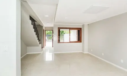 Casa com 3 quartos para alugar na Rua Ronaldo Molina de Quadros, 410, Mário Quintana, Porto Alegre, 102 m2 por R$ 4.000