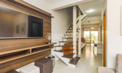 Casa em condomínio fechado com 3 quartos para alugar na Rua João Ernesto Schmidt, 60, Jardim Itu Sabará, Porto Alegre, 102 m2 por R$ 3.000