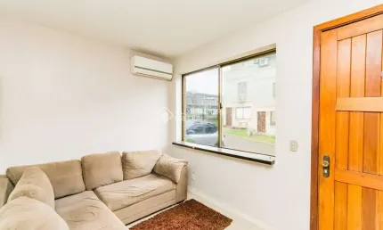 Casa em condomínio fechado com 3 quartos para alugar na Rua João Ernesto Schmidt, 60, Jardim Itu Sabará, Porto Alegre, 102 m2 por R$ 3.000