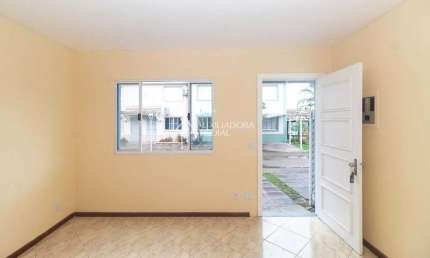 Casa em condomínio fechado com 3 quartos para alugar na Avenida José Aloísio Filho, 889, Humaitá, Porto Alegre, 120 m2 por R$ 1.750