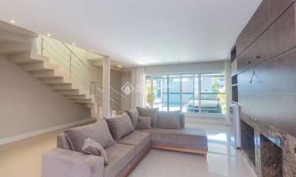 Casa em condomínio fechado com 3 quartos para alugar na Avenida Willy Eugênio Fleck, 1495, Sarandi, Porto Alegre, 234 m2 por R$ 11.500