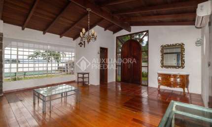 Casa em condomínio fechado com 4 quartos para alugar na Rua Vicente Failace, 21, Tristeza, Porto Alegre, 370 m2 por R$ 6.900