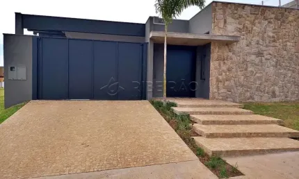 Casa térrea diferenciada em condomínio fechado, 3 suítes com armários e ar-condicionado, sala 3 ambientes, lavabo, espaço gourmet e cozinha integradas.