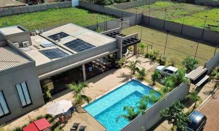 Chácara em Jardinópolis com04 suites, armários planejados, ar condicionado, varanda gourmet, churrasqueira, piscina, campo de futebol, playground.