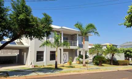 Casa sobrado para venda e locação 4 suítes condomínio Villa Florença