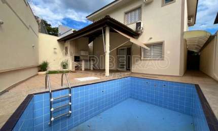 Casa sobrado em condomínio com 3 suítes e piscina para locação no bairro Nova Aliança