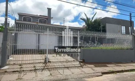 Sobrado semimobiliado com 4 dormitórios, churrasqueira para alugar, 395 m² - Oficinas - Ponta Gross