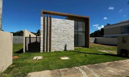 Casa térrea 3/4 com 2 suites condomínio Vila Florença em Abrantes, Camacari - BA