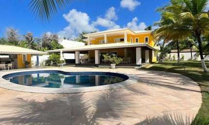 Excelente casa, pé na areia com 5/4, sendo 4 suítes a 60m da praia Busca Vida / Camaçari BA