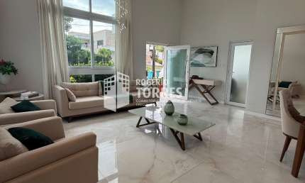 Casa Térrea a venda de 6 suítes, piscina e área gourmet com churrasqueira e 4 garagens em Alphaville Litoral Norte 2