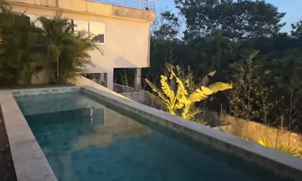 Casa em condomínio fechado com 4 quartos para alugar na Rua Caraíva, Abrantes, Camaçari