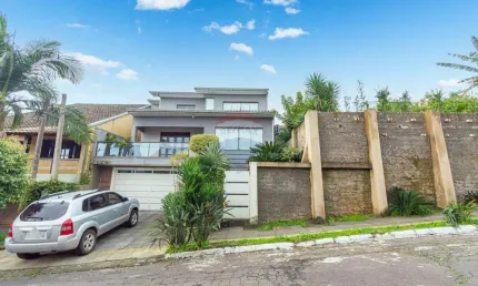 Casa com 3 quartos à venda na Rua João Carlos Linck, 140, Loteamento Jardim Timbaúva, Gravataí