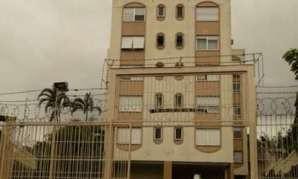 OTIMA LOCALIZAÇÃO ED. PEQUENO COM ELEVADOR AMPLO APTO.  1 DORM. COM GARAGEM