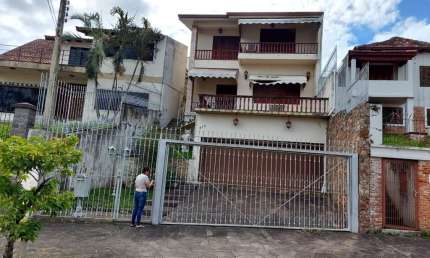 Casa com 6 quartos à venda na Rua Tomaz Edison, 416, Santo Antônio, Porto Alegre