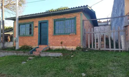 TERRENO COM DUAS CASAS DE 2 DORMITÓRIOS NA VILA NOVA