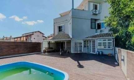 Casa com 4 dormitórios à venda, 315 m² por R$ 1.087.000,00 - Vila Nova - Porto A
