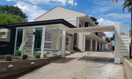 Casa com 3 dormitórios à venda, 165 m² por R$ 1.250.000,00 - Pedra Redonda - Por