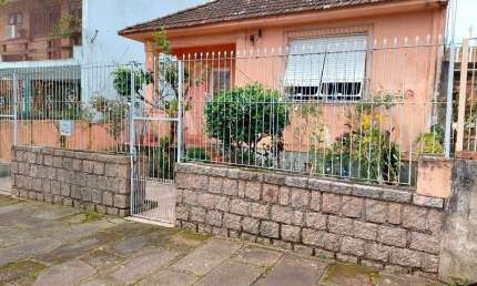 Casa com 3 quartos à venda na Rua Sebastião Wolf, 160, Nonoai, Porto Alegre