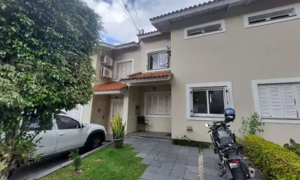 Casa com 3 dormitórios à venda, 144 m² por R$ 540.000,00 - Cavalhada - Porto Ale