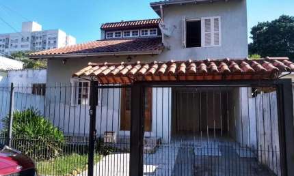 Casa com 3 dormitórios à venda, 150 m² por R$ 633.000,00 - Cavalhada - Porto Ale