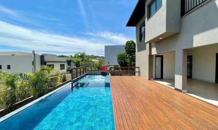 Sobrado alto padrão, com 402m², 4 quartos/suítes, no Condomínio Alphaville 1 I Imobiliária em Ribeirão Preto/SP I Brioni imóveis