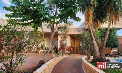 Casa térrea na City Ribeirão, construção 223 m², terreno 528,00 m², 3 suítes, sendo 2 com closet, sala de 2 ambientes integrada à cozinha, escritório.