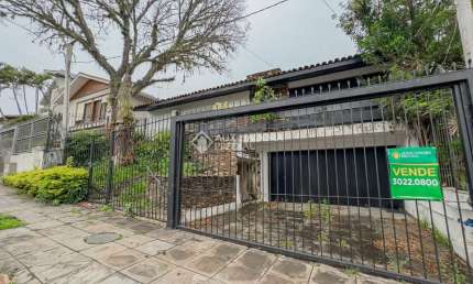 Casa com 4 quartos à venda na Rua Professor Fernando Carneiro, 102, Três Figueiras, Porto Alegre, 360 m2 por R$ 1.450.000