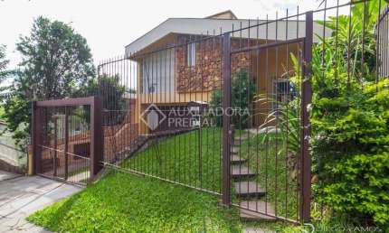 Casa em condomínio fechado com 3 quartos à venda na Rua Cláudio Manoel da Costa, 140, Jardim Itu Sabará, Porto Alegre, 262 m2 por R$ 899.000