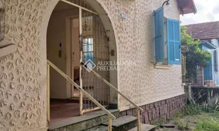 Casa com 4 quartos à venda na Avenida Felipe Weimann, 98, Santa Tereza, Porto Alegre, 180 m2 por R$ 348.000