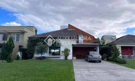 Casa em condomínio fechado com 5 quartos à venda na Avenida Homero Ribeiro, 1, Remanso, Xangri-Lá, 273 m2 por R$ 1.900.000