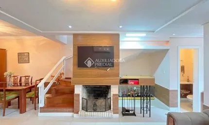Casa em condomínio fechado com 3 quartos à venda na Avenida Coronel Marcos, 1608, Pedra Redonda, Porto Alegre, 189 m2 por R$ 750.000