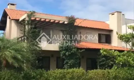 Casa em condomínio fechado com 4 quartos à venda na Avenida Homero Ribeiro, 1, Remanso, Xangri-Lá, 348 m2 por R$ 3.510.000
