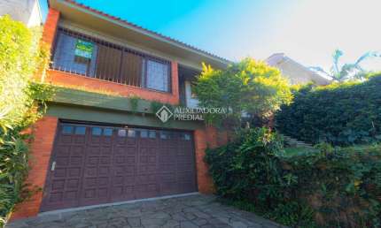 Casa em condomínio fechado com 3 quartos à venda na Rua Felipe Becker, 419, Três Figueiras, Porto Alegre, 300 m2 por R$ 1.195.000