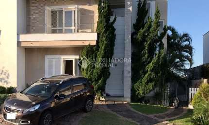 Casa em condomínio fechado com 4 quartos à venda na Avenida Edgar Pires de Castro, 540, Campo Novo, Porto Alegre, 178 m2 por R$ 1.070.000