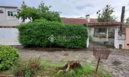 Casa com 3 quartos à venda na Rua Mura, 145, Guarujá, Porto Alegre, 316 m2 por R$ 590.000