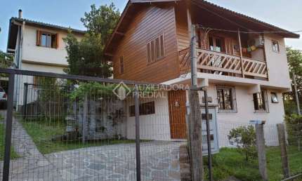 Casa em condomínio fechado com 3 quartos à venda na Estrada das Furnas, 746, Vila Nova, Porto Alegre, 300 m2 por R$ 399.000