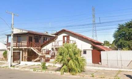 Casa com 4 quartos à venda na Rua Cinco, 02, Guajuviras, Canoas, 100 m2 por R$ 420.000