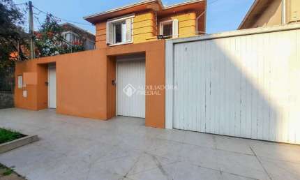 Casa em condomínio fechado com 5 quartos à venda na Rua Professor Juvenal Miler, 91, Rio Branco, Porto Alegre, 360 m2 por R$ 1.700.000