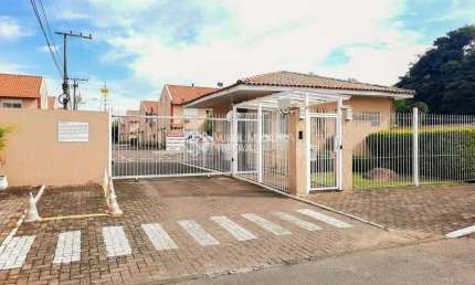 Casa em condomínio fechado com 2 quartos à venda na Rua Treze de Maio, 630, Rio Branco, Canoas, 103 m2 por R$ 279.900