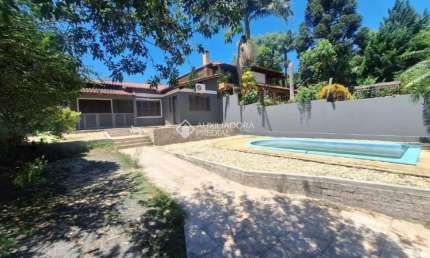 Casa em condomínio fechado com 2 quartos à venda na Avenida Senador Salgado Filho, 6614, São Lucas, Viamão, 112 m2 por R$ 550.000