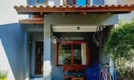 Casa em condomínio fechado com 3 quartos à venda na Rua Alcebíades Ribeiro, 32, Aberta dos Morros, Porto Alegre, 107 m2 por R$ 470.000