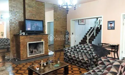 Casa em condomínio fechado com 3 quartos à venda na Rua Coronel Neves, 472, Medianeira, Porto Alegre, 450 m2 por R$ 1.600.000