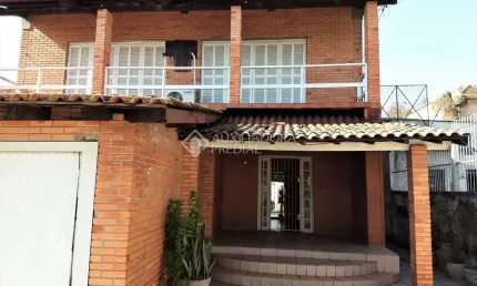 Casa em condomínio fechado com 3 quartos à venda na rua coronel neves, 472, medianeira, porto alegre, 450 m2 por r$ 1.600.000